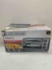 Picture of BLACK+DECKER 4-Slice Convection Oven, Stainless Steel, Curved Interior fits a 9 Inch Pizza